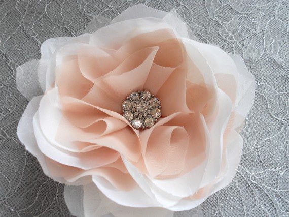 To all the brides wearing the blush organza dress by Vera look at this: :  wedding dress flower hair Il 570xN.230374788