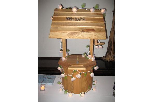 Instead we used a wishing well and put flower lights on it Card Box Ideas