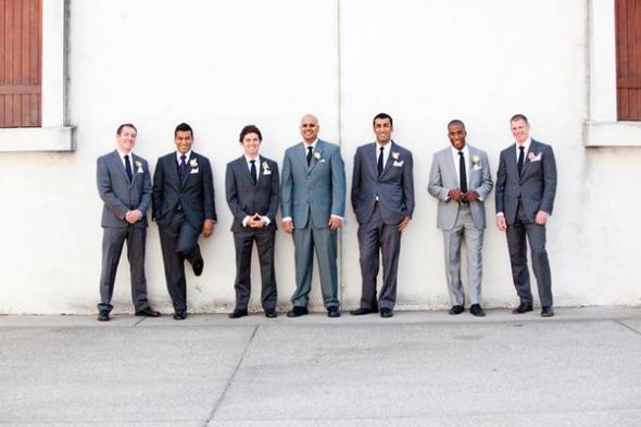 wedding grey groomsmen suits and groom black suit
