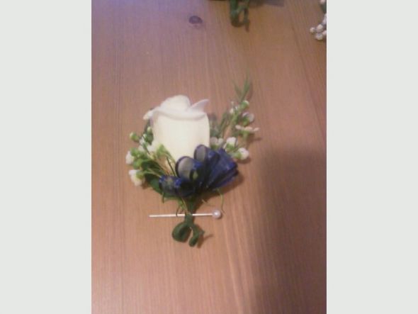 show off your completed DIY projects! : wedding Boutinere