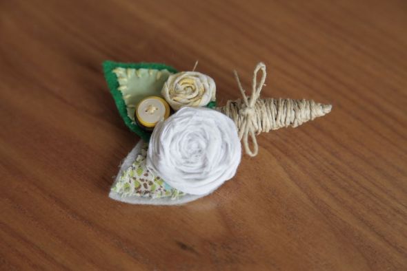 I made my own Boutonnieres :  wedding boutonnieres ceremony diy flowers green ivory silver white yellow Groom