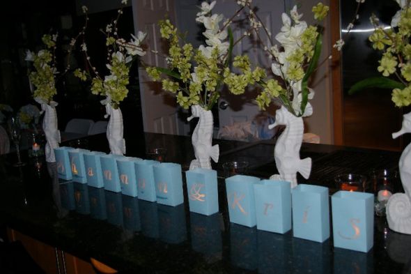 8 white ceramic centerpiece seahorse vases with white and green artificial