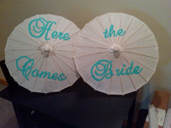How old is your flower girl and what is she carrying? : wedding Parasols