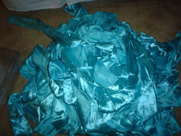 Beautiful purple and turquoise satin chair sashes and table runnerstable