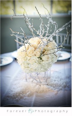 Need some help for my Winter Wonderland wedding! :  wedding winter icy blue wedding Winter Wonderland Centerpiece With Hydrangea Roses And Branches