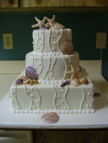 Show me your cake! : wedding purple fondant superhero tiered Seashell Wedding Cake Jamaica 430x572
