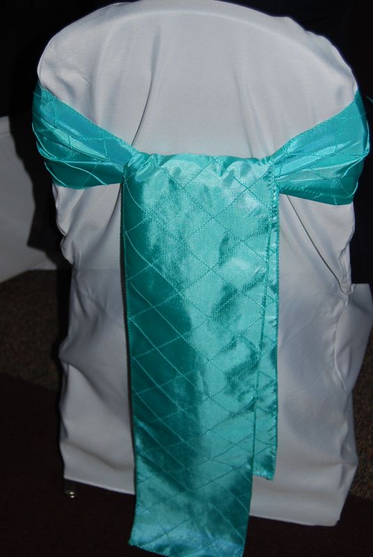 WHITE POLYESTER BANQUET CHAIR COVERS AND TIFFANY BLUE TURQUOISE CHAIR SASHES