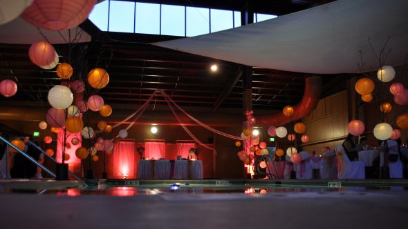 Our Poolside Masquerade Ball wedding orange pink par 38 can Magicroom