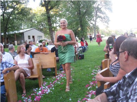 A Rustic Outdoor Wedding!  Look at the church we built in out front yard! (pics) :  wedding rustic outdoor arch hay bales country simple 304698 2427557249672 1273777045 32959724 55760457 N