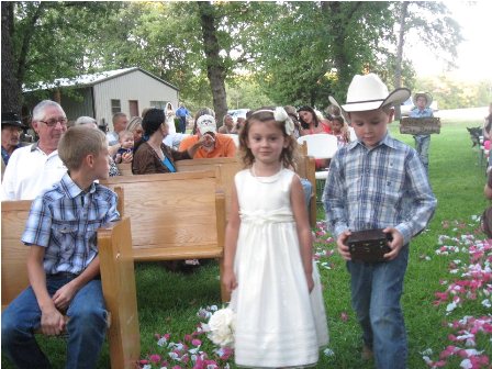 A Rustic Outdoor Wedding!  Look at the church we built in out front yard! (pics) :  wedding rustic outdoor arch hay bales country simple 313135 2427500888263 1273777045 32959677 1232720172 N
