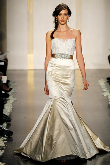 it looks similar to Lazaro Bridal Gowns Style LZ3105 Wedding Dresses or