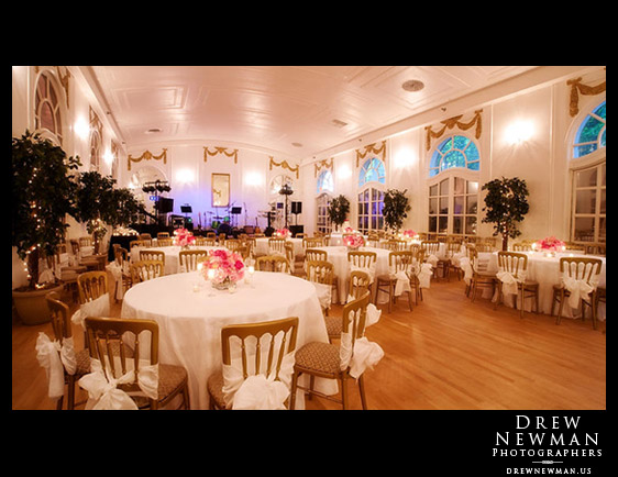 Gold venue chairs but purple and silver reception theme wedding color 