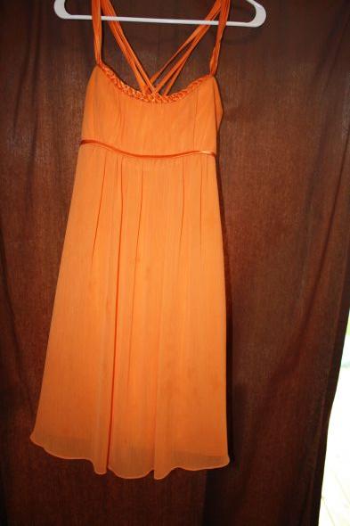 David's Bridal Tangerine Dress ina size 4 Worn for a few hours 30