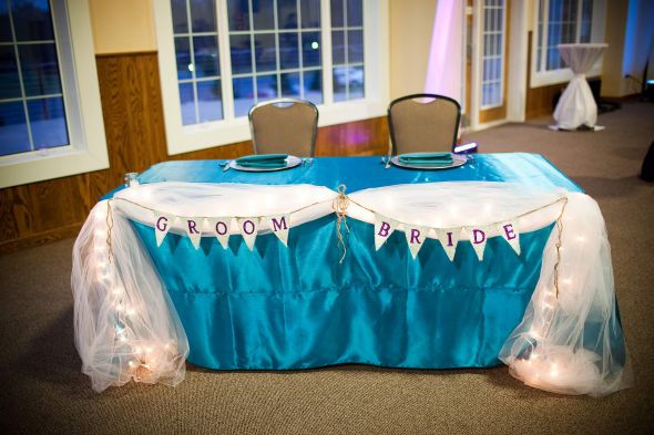 17 Eggplant 132 rounds satin table cloth to the floor on a 72 round 