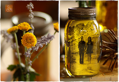 How can I use mason jars in centerieces for my rustic vintage 