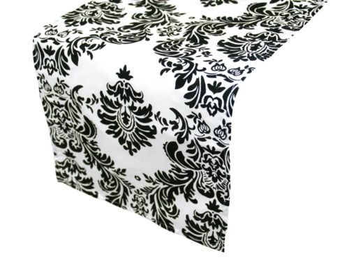 Hey I had 14 black and white damask table runners made for my wedding 