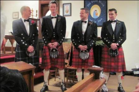 How is your fiance standing out from groomsmen in regards to tuxedo/suit? :  wedding Church