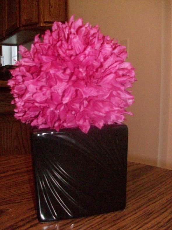 We used fuschia kissing balls for both pew decorations and reception decor