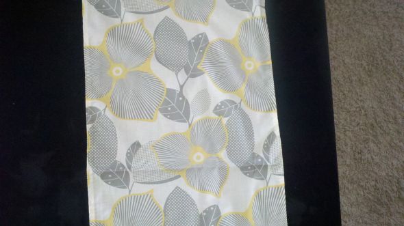 grey and yellow table runner