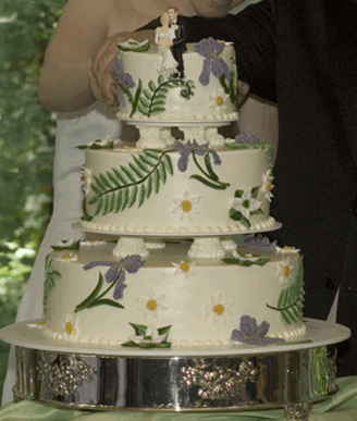  wedding cake purple flowers green nature theme ivory Wedding Cake Nature
