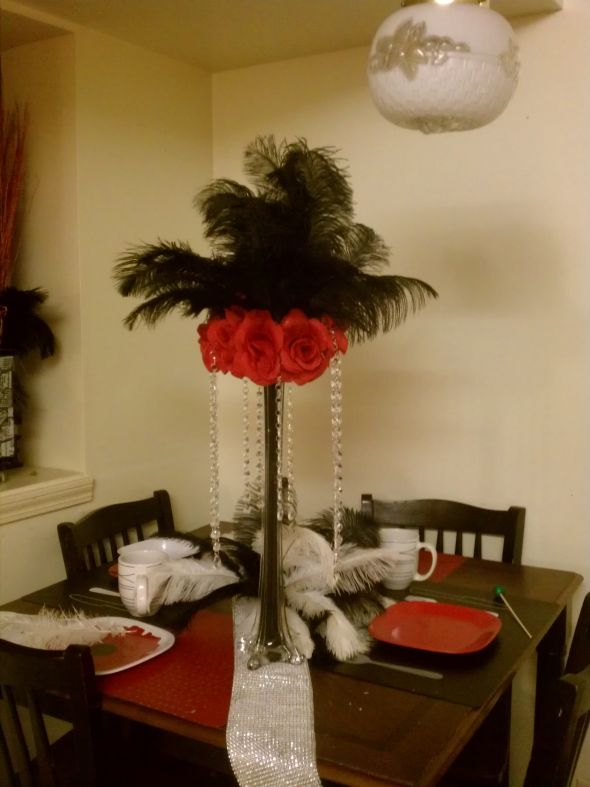 Roses Feathers and Crystal Centerpieces Took about 7 mins to assemble