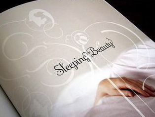 Can anyone help me identify this font? :  wedding font invitation Sleeping Beauty