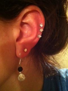Ear piercing... ow! :  wedding Photo 38