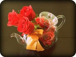 Centerpiece Ideas for an Alice in Wonderland Queen of Hearts/ Card Game theme? :  wedding decor centerpiece Roseteapot