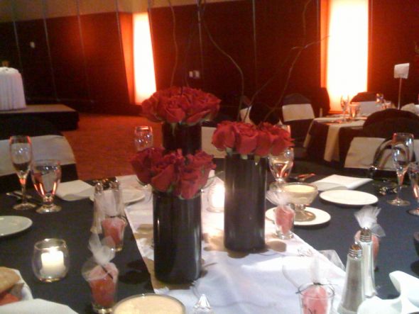  half of our tables wedding black red white flowers reception Photo