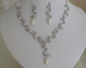 Which necklace looks best with my dress?? :  wedding necklace swarovski dress bling Il 170x135 260369534 Need suggestions for jewelry! :  wedding bling jewelry swarovski Il 170x135 260369534 