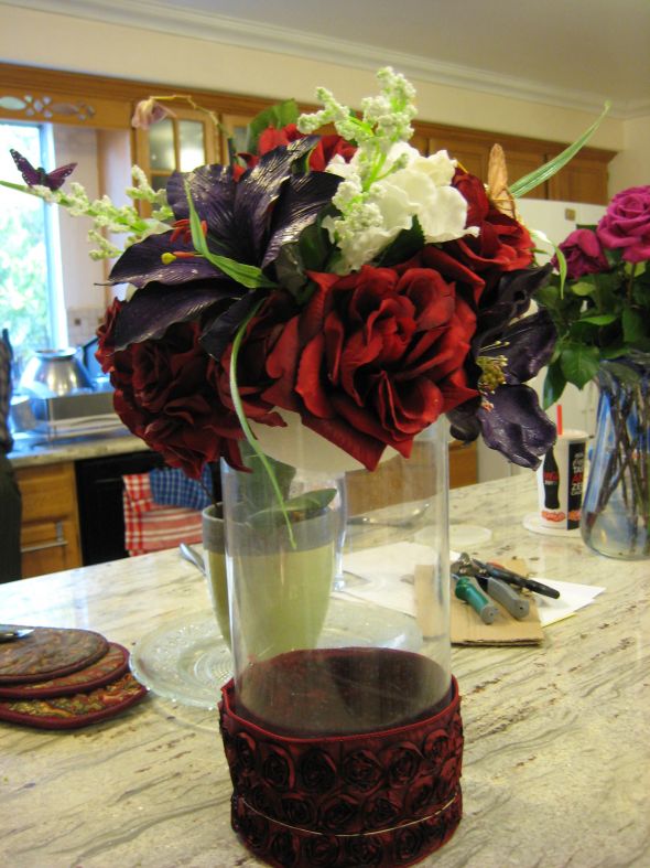 I started my centerpieces There will be another maroon plain ribbon on the