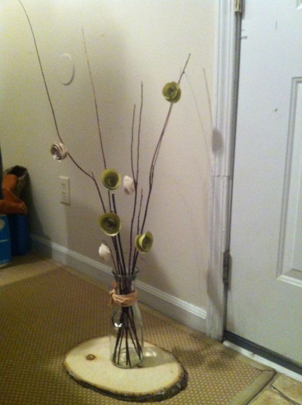 I made my shabby chic rustic centerpieces out of paper and sticks