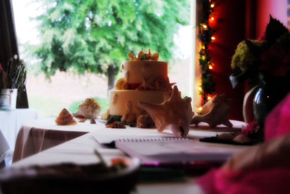 Is anyone else having a reception back home after their destination wedding? :  wedding Cake 8 With Lights Pretty Pic