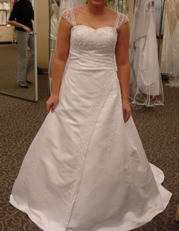 This dress is no longer available from David's Bridal and is absolutely