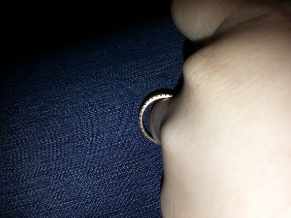 Wedding ring feels loose, and is prone to slipping off when I wash my  hands, etc. I know it seems obvious to just get the next size down, but  what if it's