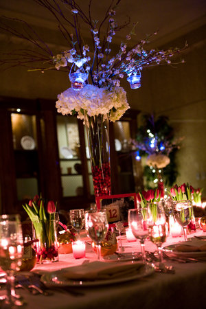 Mrs Penguin's glass and orchid centerpieces