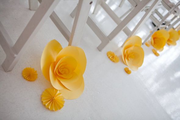 wedding Yellow Paper Flowers and smaller versions on the chairs lining the