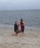 Surprise Vacation proposal on the Beach at Cape Cod