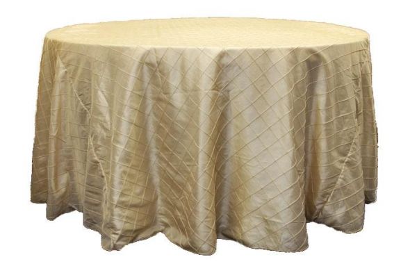 I have Champagne and Chocolate pintuck tablecloths in 120inch Round for rent