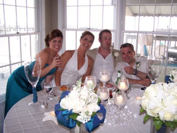 Finally decided! Easy, inexpensive, beautiful centerpiece! :  wedding easy inexpensive cheap centerpiece floating candle wine glass Blheadtabquingrahm