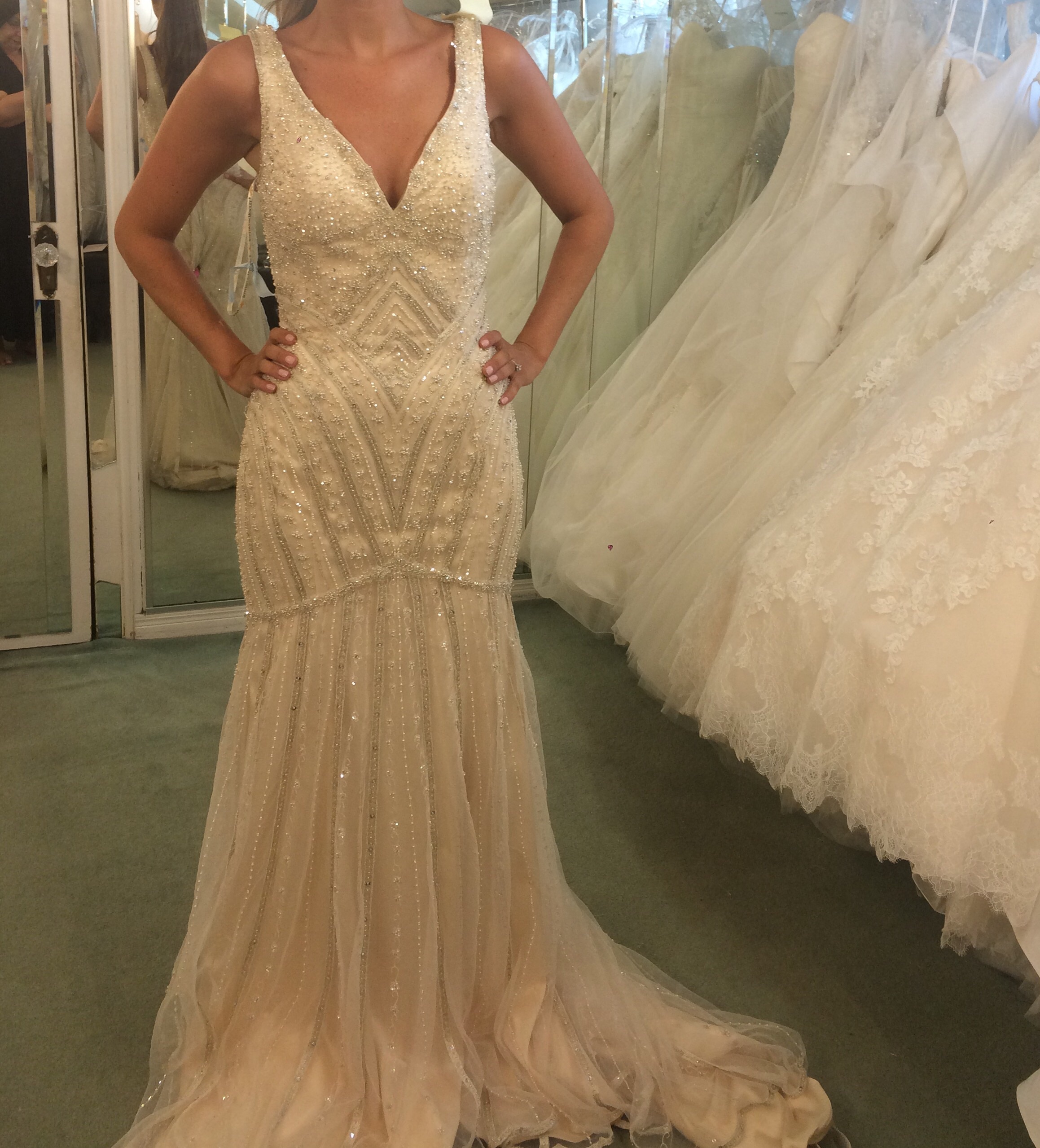 Has anyone worn a heavily beaded champagne/gold maggie sottero dress? Has anyone worn a heavily beaded champagne/gold maggie sottero dress?