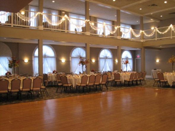 To cover the chairs or to not cover the chairs... that is the question. :  wedding chair covers decor reception Waterviewnocovers