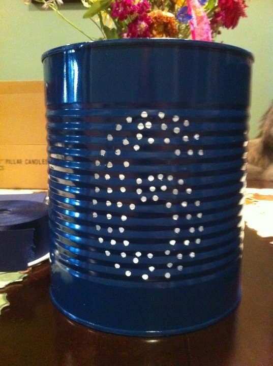 Navy blue tin can table number luminaries and lace trimmed tea lite candles