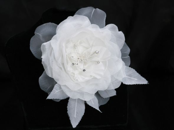 I am selling this bridal hair flower for 15 shipping included and I 
