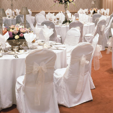  wedding linen items such as cloth napkins and white round tablecloths