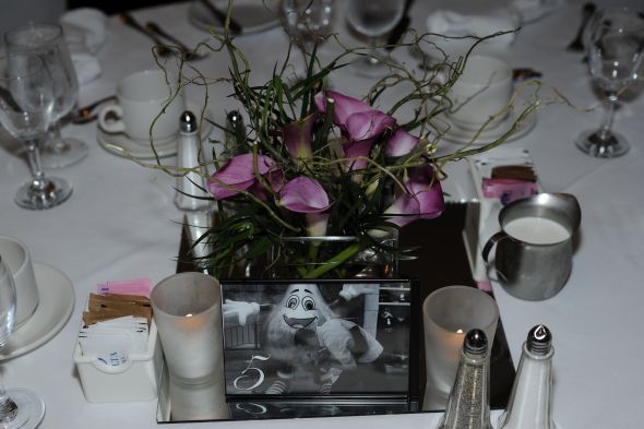 Centerpieces and Table numbers the centerpieces were pink mini calla 39s with