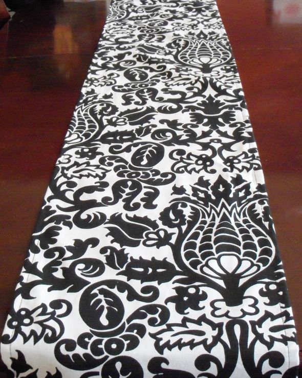 I have black white damask table runners squares available for renting or 