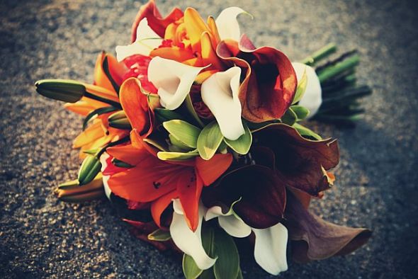 And our flowers were orange Colors Brown and greenand wedding colors 
