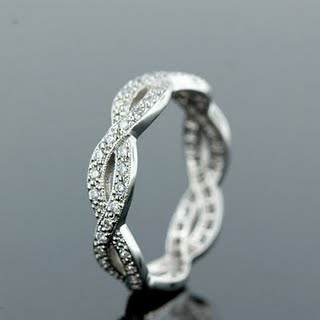 Ribbon/Criss-Cross/Infinity-style wedding band? :  wedding ribbon criss cross wedding band kwiat Prettybandintertwined