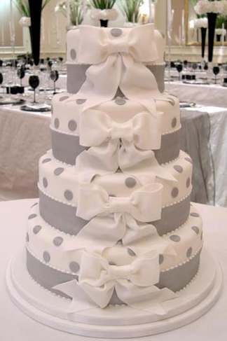 How did you incorporate polka dots and/or swiss dots into your wedding? :  wedding polka dot swiss dot decor Wedding Cake White Ribbons